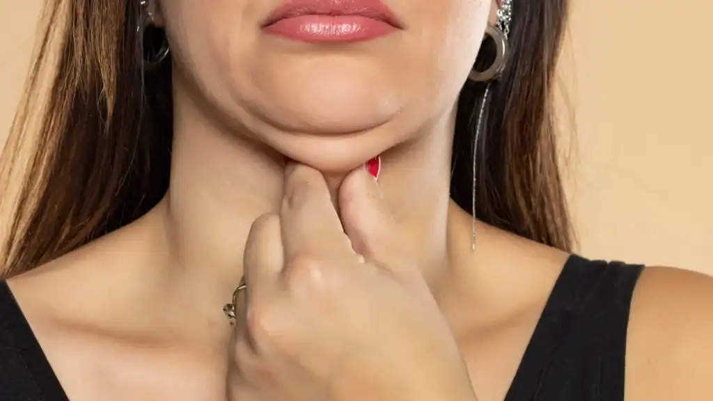 An image of a woman with double chin, sad, worried : Non Surgical Double Chin Removal Treatment in , UK